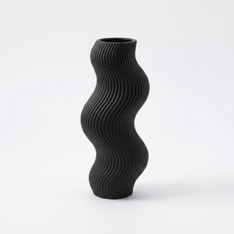 Vaso decorativo a forma di onda, nero, dal design minimalista.