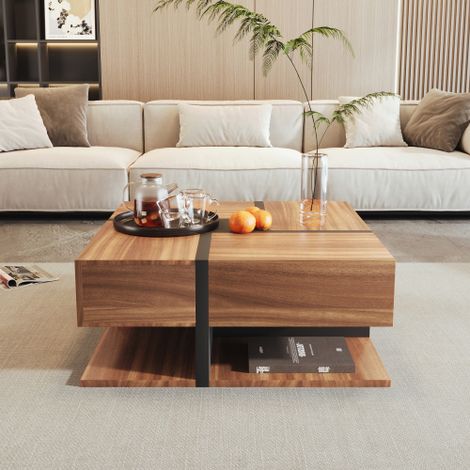 Table basse : Dotée de quatre tiroirs, d'une palette de couleurs unique, de lignes simples et fluides, ainsi que d'un espace de rangement supplémentaire à la base.