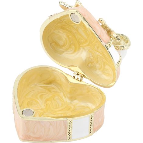 Boîte à bijoux vintage en émail rose, motif nœud papillon et cœur, ornée d'un pendentif décoratif. (1/5)