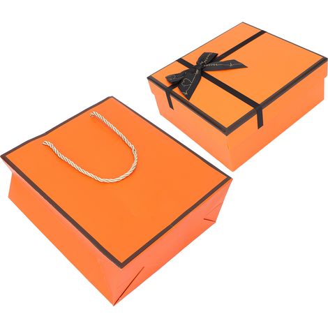 Coffret cadeau orange avec ruban et couvercle, idéal pour Noël, un anniversaire ou toute autre occasion. (1/5)