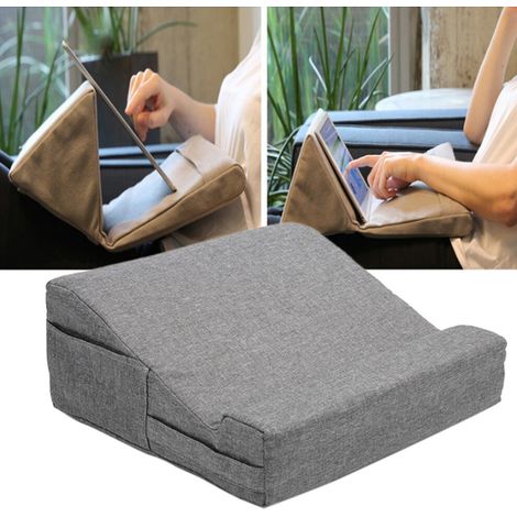 Cama de viaje portátil con ángulo ajustable y cojín suave, ideal para iPads, tabletas y libros. Dimensiones: 32 x 32 x 14 cm.