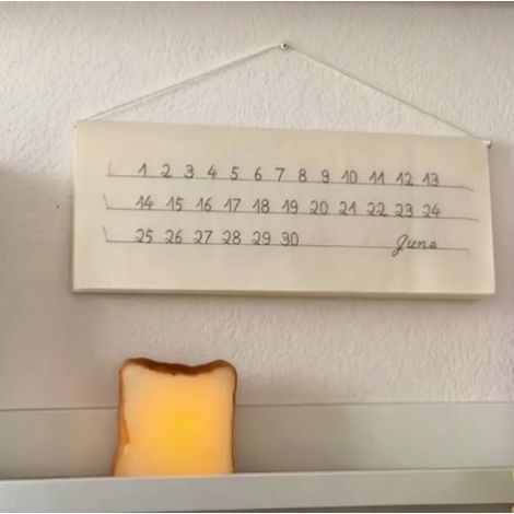 A fun embroidered calendar, perfect for hanging in the living room. (1/5)