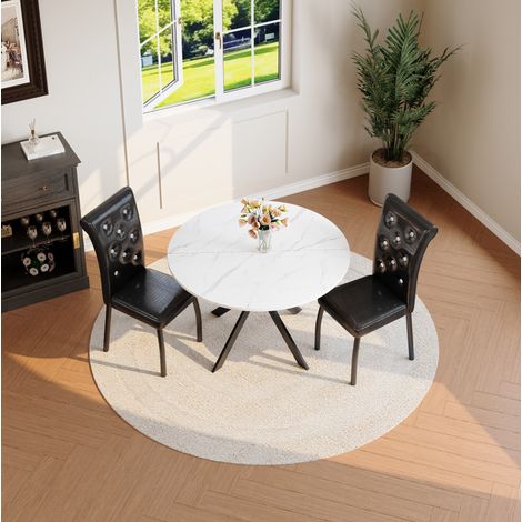 Juego de comedor redondo, mesa de MDF efecto mármol blanco y 2 sillas de cuero PVC negro con patas metálicas (1/5)