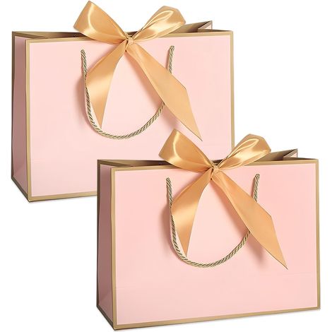 Un lot de deux sacs cadeaux en papier avec poignées est parfait à offrir aux femmes.