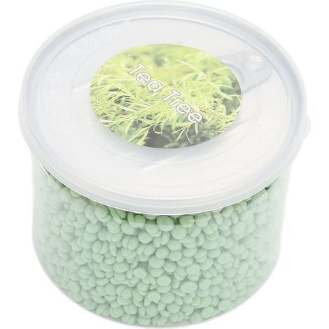 Perles de cire dépilatoire 300 g (10,6 oz) à bas point de fusion et forte adhérence pour une épilation facile et efficace grâce à l'arbre à thé. (1/5)
