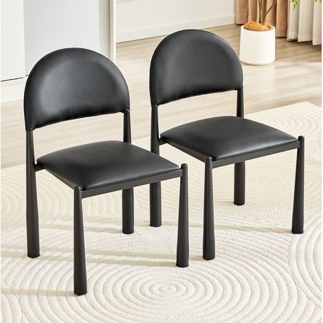 Sedia da pranzo moderna, alta 80 cm, schienale ergonomico semicircolare, rivestimento in similpelle nera, gambe in metallo. (1/5)