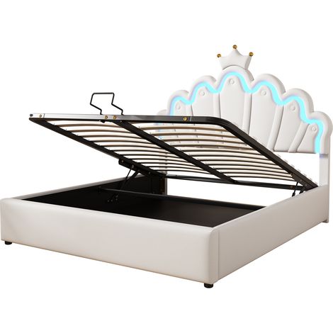 Cama tapizada 140 x 200 cm blanca con arcón y LED regulable, diseño corona (1/5)