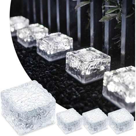 Un ensemble de 4 dalles solaires blanches avec éclairage extérieur et interrupteur, étanches, adaptées aux patios, jardins, cours, allées et terrasses, mesurant 7x7x5 cm. (1/5)