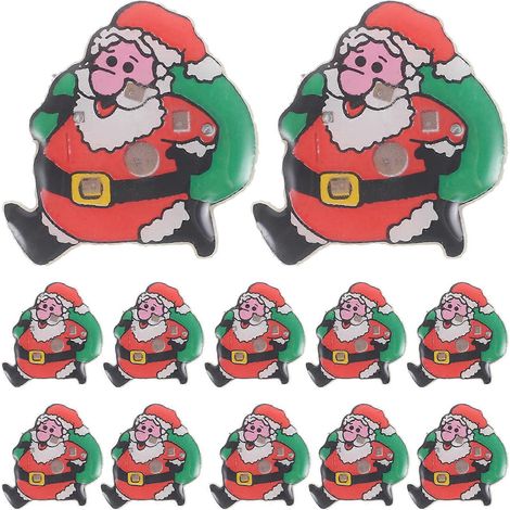 Lot de 25 broches de Noël représentant le Père Noël avec un sac cadeau et une lumière LED, idéales pour les enfants.