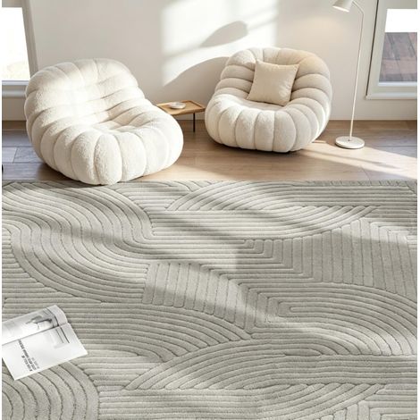 Tapis 160/120 cm gris en polyester, motif géométrique en relief et dessous stable (1/5)