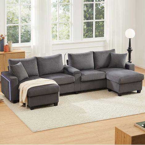 Divano a U 334x128.5x81 cm, con 2 pouf, luci LED, porta bicchiere, prese USB e Type-C, tessuto corduroy grigio (1/5)