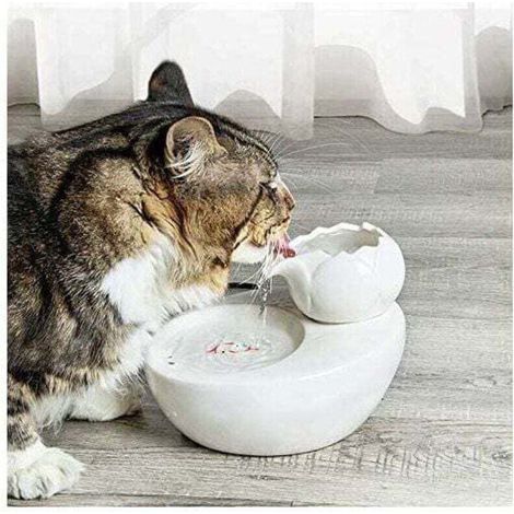 Fontaine à eau pour chats et animaux – Céramique blanche avec filtre automatique et design lotus vertical (1/5)