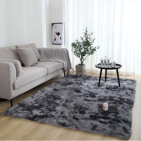 Ein großer, weicher und flauschiger Teppich, ideal für Wohn- oder Schlafzimmer. Dunkelgrau, 120 x 160 cm.