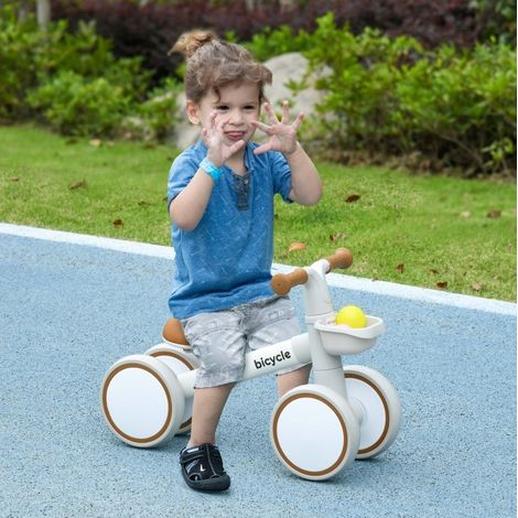 CHICFURN Bicicleta sin pedales 56x27x39 cm blanco/marrón, asiento regulable, cesta, 1-3 años (1/5)
