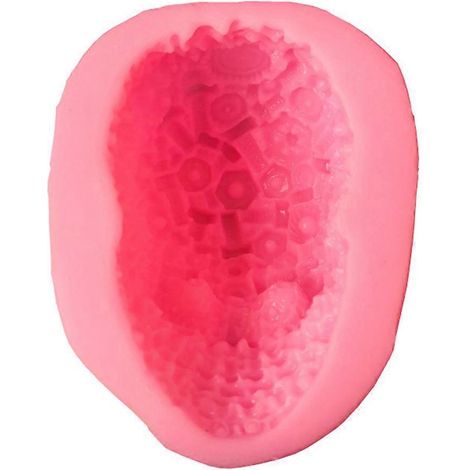 Moule en silicone pour savon, créations artisanales et objets en forme de crâne à vis.