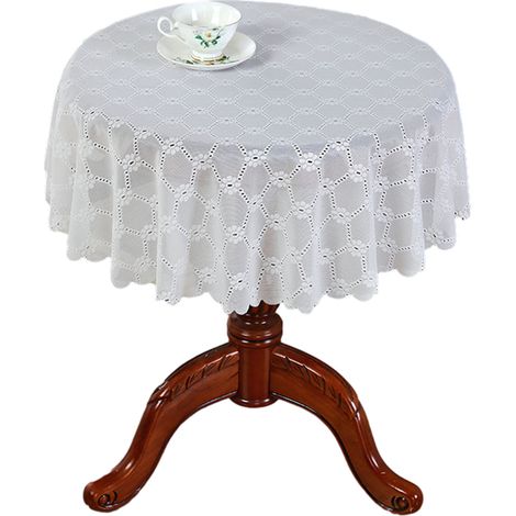 Nappe ronde en dentelle blanche, élégante décoration de table, motif losanges.