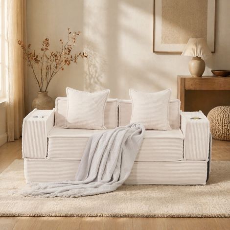 Sofá cama de 2 plazas en tejido de pana beige con 2 cojines, bolsillos laterales y portavasos (1/5)