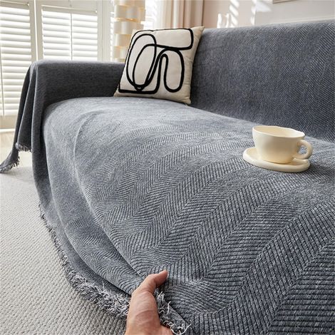 Housse de canapé unie en chenille douce pour canapé d'angle 1, 2, 3 ou 4 places, canapé en L, jeté de canapé universel, protection de canapé une pièce avec pompons (180 x 180 cm, gris foncé) (1/5)