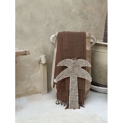 Decorazione boho con palma marrone