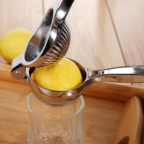 Le meilleur presse-citron - Presse-agrumes de première qualité en acier inoxydable - Presse-citron manuel (1/4)