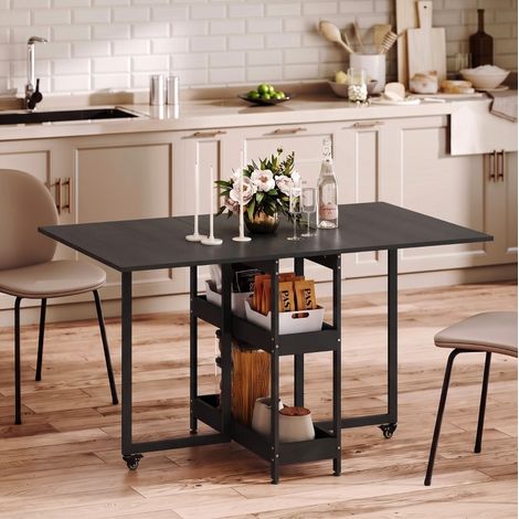 Table à manger pliante, noire, jusqu’à 4 personnes, avec 2 compartiments ouverts, roulettes avec freins et plateau extensible, 133,4 x 80 x 75 cm – CHICFURN (1/5)