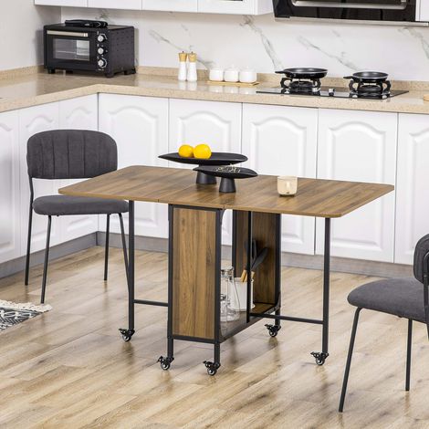 Table à manger pliante mobile 6 personnes, table cuisine avec rangement central, roulettes avec freins, bois clair 130 x 80 x 74 cm (1/5)