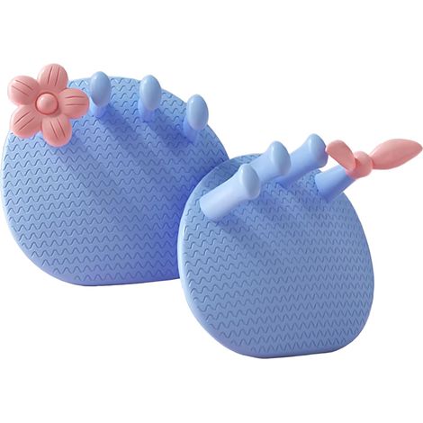 Paire d'entraîneurs d'arche bleue avec fleur rose/détail d'hélice, design ergonomique à 30° avec fond antidérapant, pour l'exercice et la correction des lignes de la voûte plantaire et des jambes. (1/5)