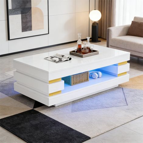 Table à café lumineuse 100x50x35cm en panneau de particules blanc, avec étagère creuse de rangement et bande LED éclatante, parfaite pour studio ou petit salon.