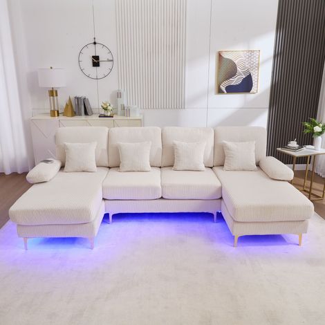 Canapé U 4 places beige - Éclairage LED + port USB-C - Bois massif - 4 coussins luxe - Dossier ergonomique (1/5)