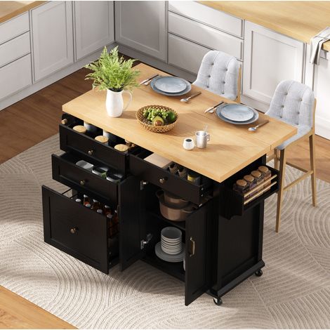 Isola cucina mobile con tavolo estensibile, vani contenitori e rotelle, nero e legno HAVRYA (1/5)