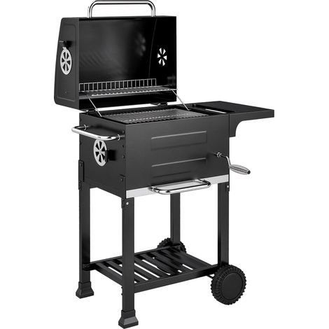 Parrilla de carbón compacta con termómetro y mesa auxiliar.