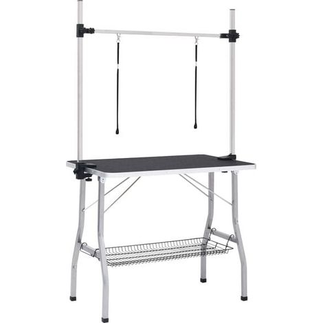 Table de toilettage pour chiens réglable avec deux anneaux de suspension et un panier.