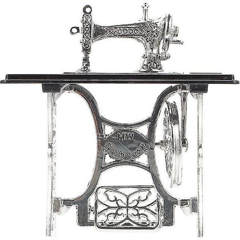 1 mini machine à coudre à pédale