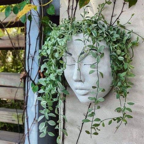 I vasi da fiori in resina da parete, con il loro design unico del coperchio, sono adatti per decorare le pareti interne e possono essere utilizzati come vasi decorativi da parete. (1/4)
