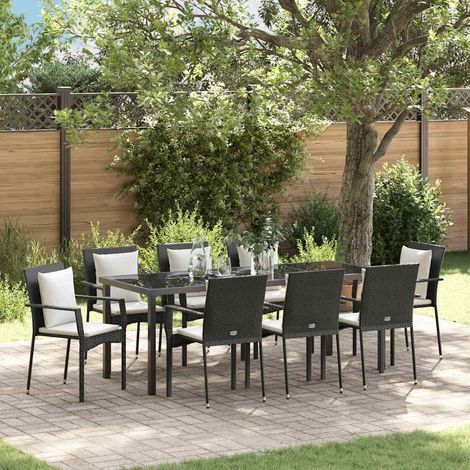Ensemble repas extérieur 9 pièces en polyrotin noir avec coussins, table et 4 chaises - PANGIVO (1/5)