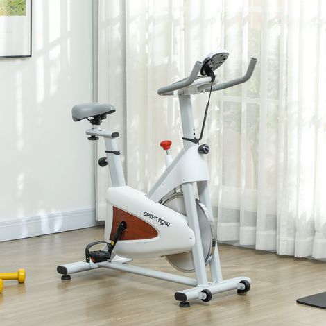 Vélo d'appartement silencieux avec selle et résistance réglables, moniteur LCD, support de tablette, blanc