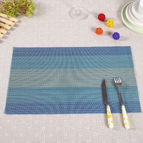 Juego de 4 manteles individuales de vinilo, resistentes al calor y a las manchas, plegables y lavables, ideales para decorar la mesa de la cocina. (1/5)