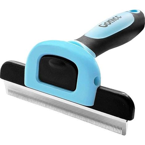 Cepillo para el cuidado de perros y gatos para eliminar el subpelo.