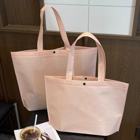 Juego de 10 bolsas de compra no tejidas, perfectas para ir al supermercado y para uso diario. Dimensiones: 36 x 24 x 10 cm. Rosa. (1/5)