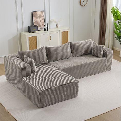 Modulares Ecksofa grau aus Cord in L-Form mit Chaiselongue und tiefen Sitzen (1/5)