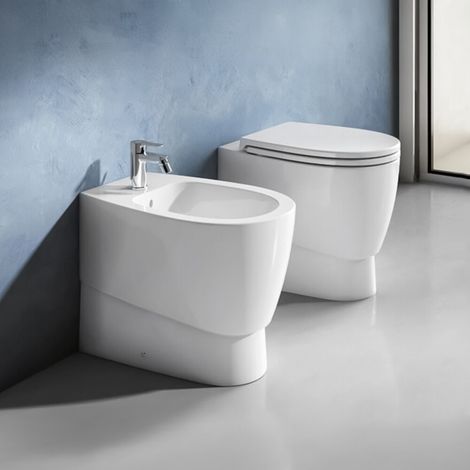Sanitari filo muro bianco lucido con scarico traslato rimless e copriwc Demy Dolomite (1/5)