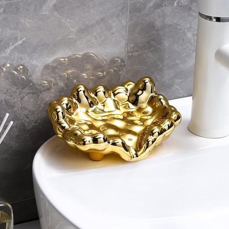 Dispenser di sapone creativo con portasapone autosvuotante, supporto antiscivolo per bagno, cucina e viaggi, design monoblocco color oro. (1/5)