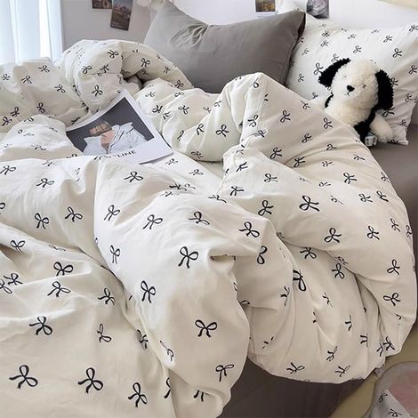 Parure de lit, housse de couette de 135 x 200 cm et taie d'oreiller de 40 x 80 cm, en microfibre douce, avec fermeture éclair, motif de nœuds blancs et noirs, pour fille (1/5)