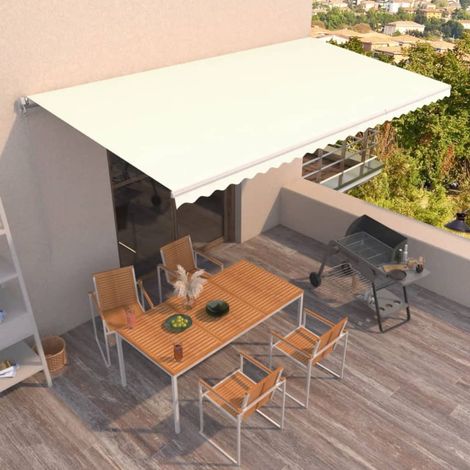 Toldo retráctil manual crema 600x350 cm