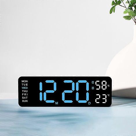 L'horloge numérique 5503 est une horloge simple et multifonctionnelle au design rectangulaire et aux grands caractères. Elle peut être fixée au mur ou posée sur un support. Son boîtier noir est orné d (1/5)