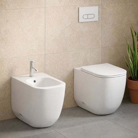 Sanitari filo muro in ceramica bianca opaca con copriwc e scarico tornado Kora (1/5)