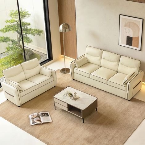 Canapé deux places similicuir beige, rembourré épais, avec poche latérale et deux coussins, dimensions 136x81x90 cm (1/5)