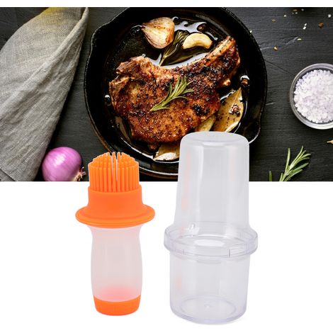 Aceitera de 60 ml fabricada en silicona apta para uso alimentario con cepillo, color naranja. (1/5)