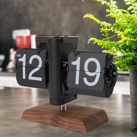 Reloj digital retro con mecanismo plegable, funciona con pilas, diseño minimalista, madera negra. (1/5)