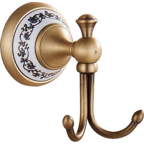 Crochets porte-serviettes muraux en porcelaine bleue et blanche antique avec détails en bronze. (1/4)